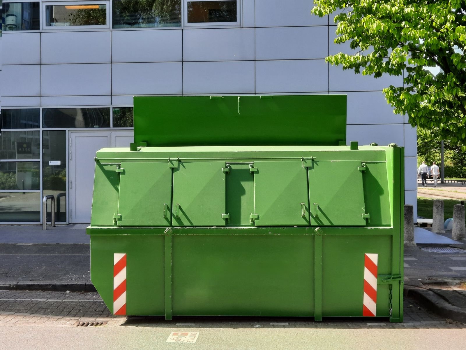 Roll-off dumpster in a lot
